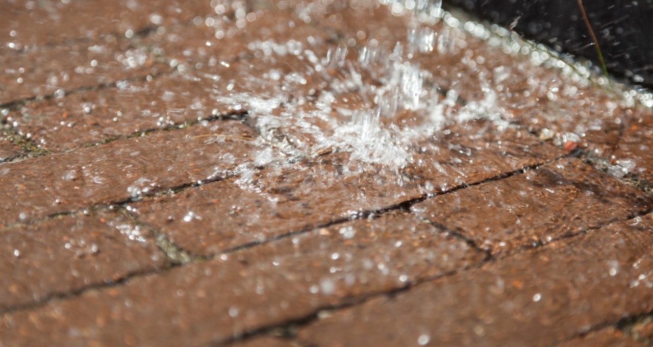 Water is falling on pavers